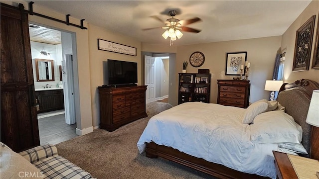 13817 Grant Way, Oak Hills, CA 92344 - bedroom with carpet floors, a sink, baseboards, ensuite bathroom, and ceiling fan