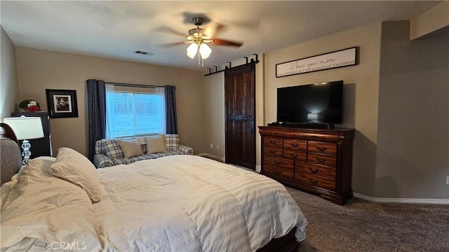 13817 Grant Way, Oak Hills, CA 92344 - bedroom featuring carpet flooring, baseboards, a barn door, and ceiling fan