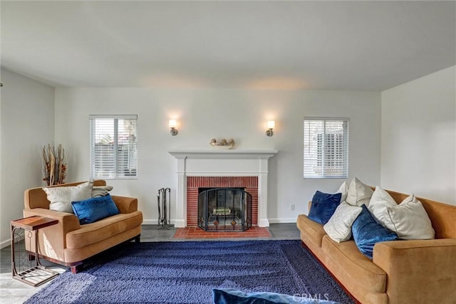 8910 S 3rd Ave, Inglewood, CA 90305 - living room featuring a fireplace, baseboards, and wood finished floors