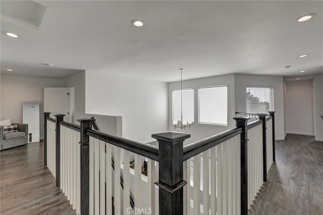 8910 S 3rd Ave, Inglewood, CA 90305 - hall featuring an upstairs landing, wood finished floors, recessed lighting, and baseboards