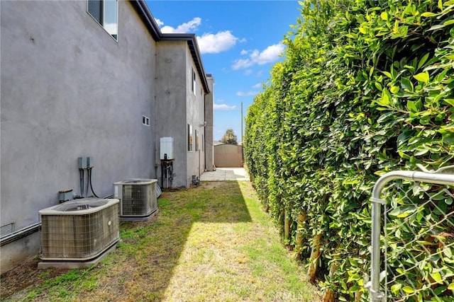 8910 S 3rd Ave, Inglewood, CA 90305 - view of grassy yard with central air condition unit