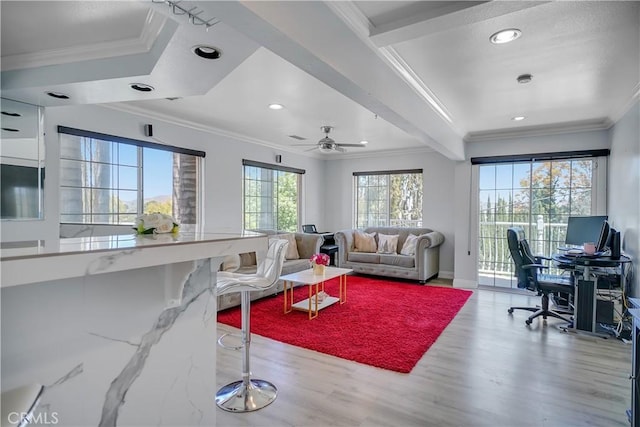living area with ornamental molding, wood finished floors, a desk, recessed lighting, and ceiling fan