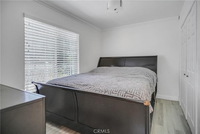 20171 Corona St, Corona, CA 92881 - bedroom featuring light wood-type flooring, crown molding, a closet, and baseboards