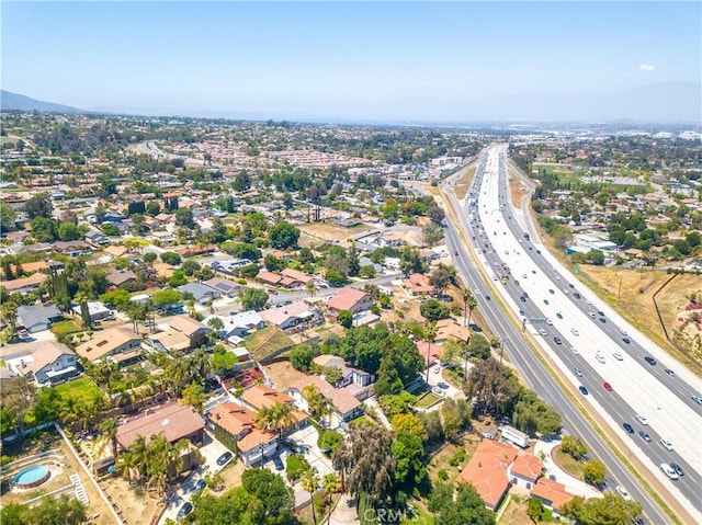 aerial view of property's location featuring a major roadway