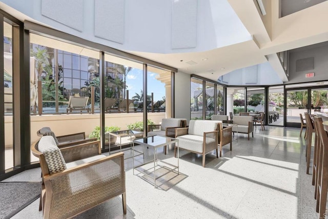 building lobby featuring a towering ceiling