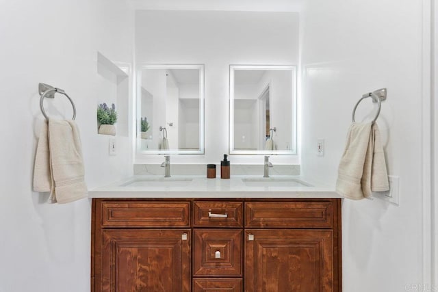 full bathroom featuring double vanity