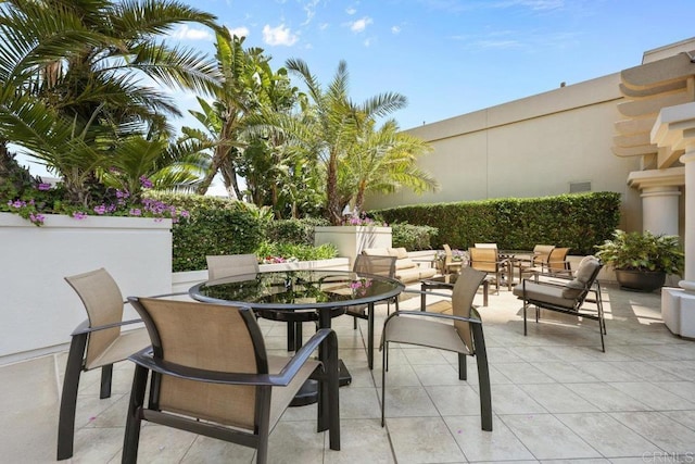 view of patio / terrace featuring outdoor dining area and an outdoor living space