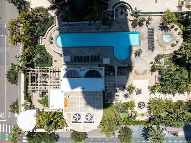 aerial overview of property's location with a pool area
