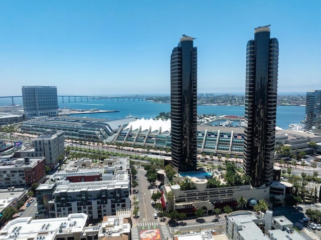 view of urban area featuring a nearby body of water