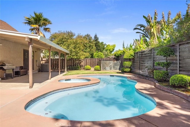 2604 Veneman Ave, Modesto, CA 95356 - view of pool featuring a fenced backyard, an in-ground hot tub, a patio area, and area for grilling