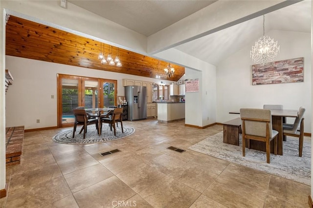 2604 Veneman Ave, Modesto, CA 95356 - dining room with a chandelier, lofted ceiling, and baseboards