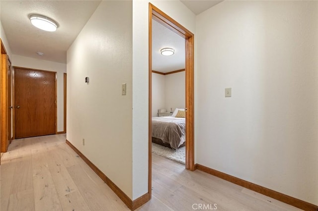 2604 Veneman Ave, Modesto, CA 95356 - hall featuring light wood-style flooring and baseboards