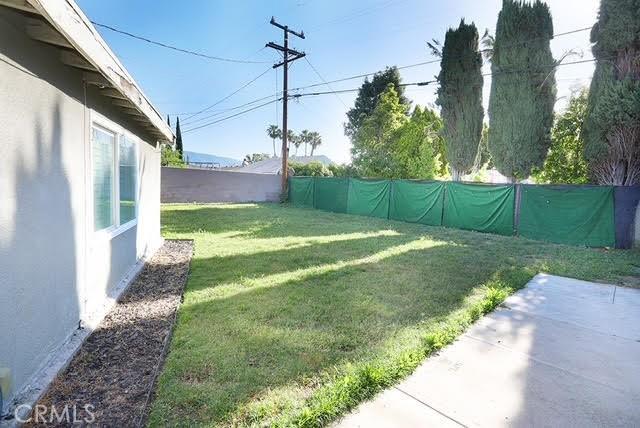 885 N Millard Ave, Rialto, CA 92376 - view of yard featuring a patio