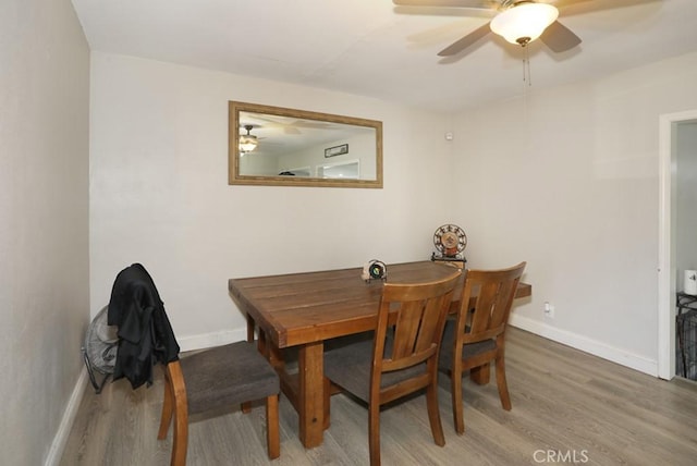 885 N Millard Ave, Rialto, CA 92376 - dining space featuring light wood-style flooring, ceiling fan, and baseboards