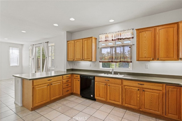 kitchen featuring black dishwasher, a sink, a peninsula, light tile patterned floors, and recessed lighting