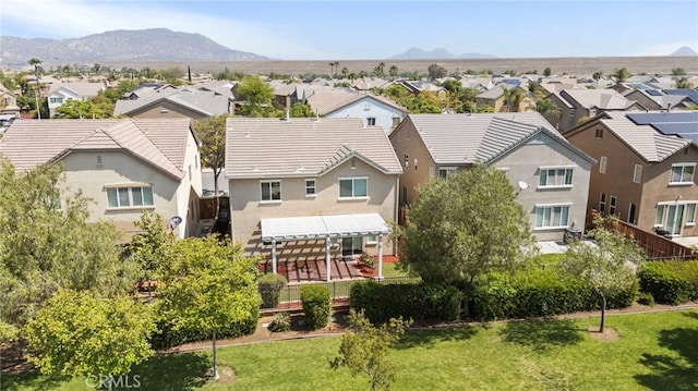aerial perspective of suburban area featuring mountains