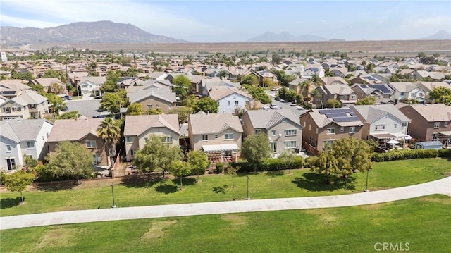 aerial perspective of suburban area featuring a mountainous background