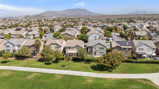 aerial perspective of suburban area with a mountain backdrop