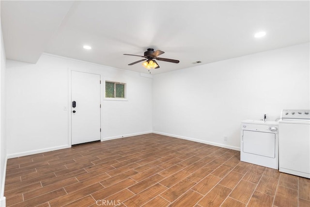 washroom with separate washer and dryer, a ceiling fan, wood finished floors, recessed lighting, and baseboards