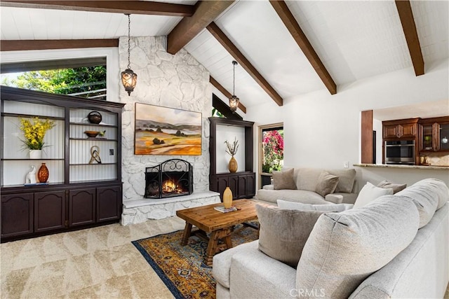 living area featuring light colored carpet and a stone fireplace