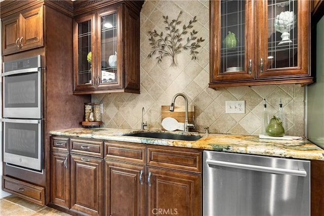 indoor wet bar with appliances with stainless steel finishes and decorative backsplash