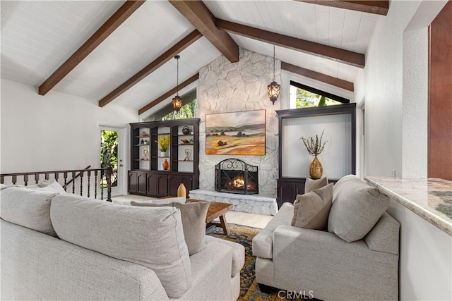 living room with a fireplace and healthy amount of natural light