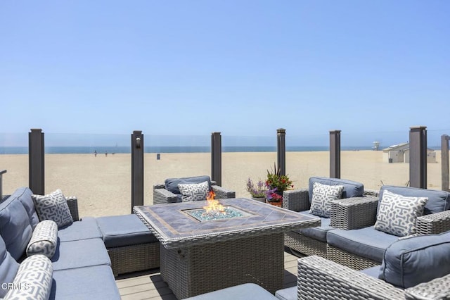 325 Ocean Dr, Oxnard, CA 93035 - view of patio / terrace with an outdoor living space with a fire pit and a water view