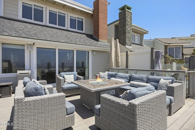 325 Ocean Dr, Oxnard, CA 93035 - wooden deck featuring an outdoor living space with a fire pit and fence