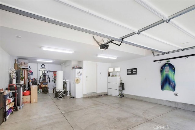 2651 W Lincoln Ave Unit 40, Anaheim, CA 92801 - garage featuring a garage door opener