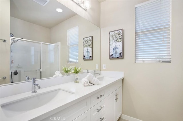 2651 W Lincoln Ave Unit 40, Anaheim, CA 92801 - full bath with double vanity, a shower stall, and recessed lighting