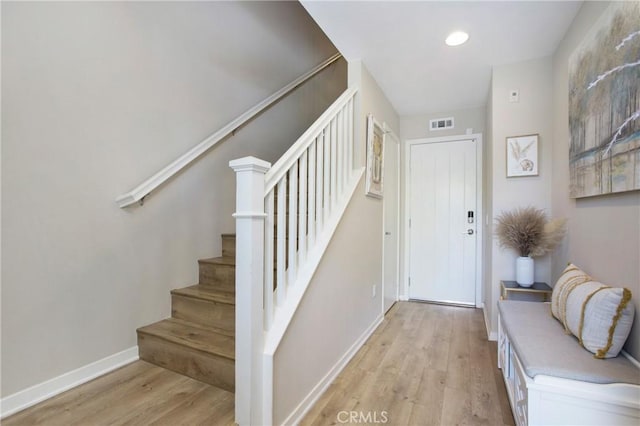 2651 W Lincoln Ave Unit 40, Anaheim, CA 92801 - entrance foyer with light wood-style floors, stairway, and recessed lighting