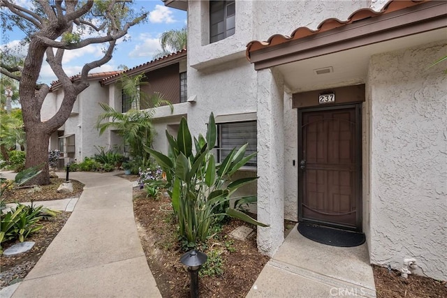 237 Oahu Way, Placentia, CA 92870 - entrance to property with stucco siding and a tile roof