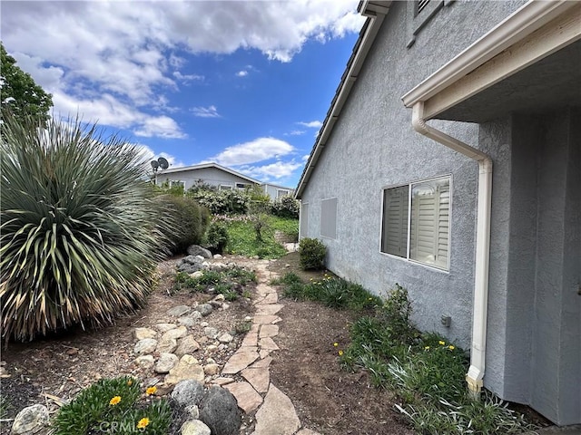 41023 Cedar Ridge Ln, Cherry Valley, CA 92223 - view of property exterior featuring stucco siding