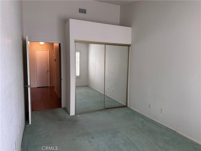 41023 Cedar Ridge Ln, Cherry Valley, CA 92223 - unfurnished bedroom with carpet flooring, a closet, and baseboards