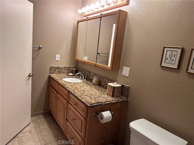 41023 Cedar Ridge Ln, Cherry Valley, CA 92223 - bathroom with vanity, tile patterned floors, and toilet