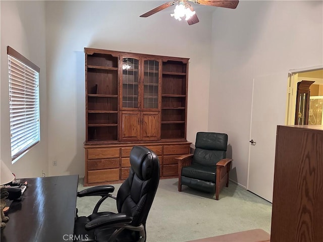 41023 Cedar Ridge Ln, Cherry Valley, CA 92223 - office space with light colored carpet, a ceiling fan, and a high ceiling