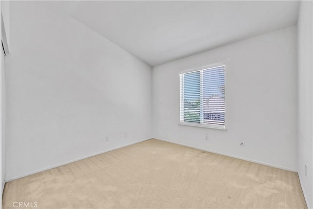 6981 Rivertrails Dr, Eastvale, CA 91752 - spare room with light colored carpet and baseboards