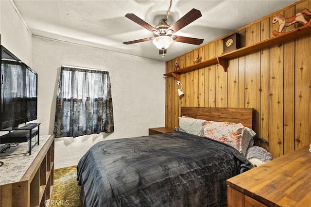 2831 Foothill Blvd, Oroville, CA 95966 - bedroom featuring carpet flooring, wooden walls, and a ceiling fan