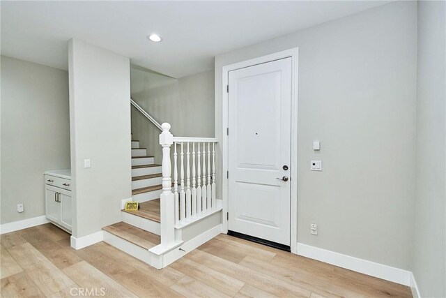 223 Gaspar, Irvine, CA 92618 - foyer with light wood-style floors, baseboards, stairs, and recessed lighting