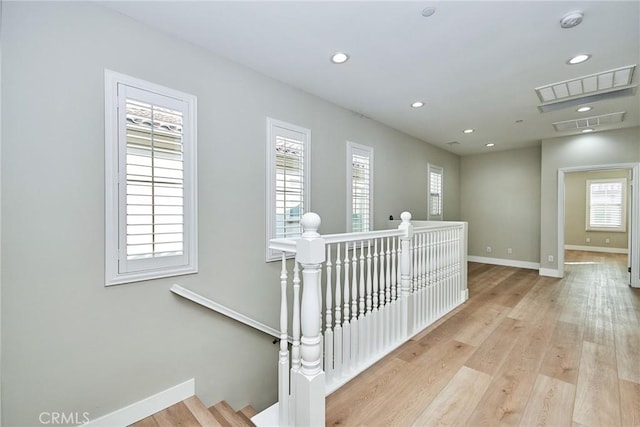 223 Gaspar, Irvine, CA 92618 - hall featuring an upstairs landing, plenty of natural light, baseboards, and recessed lighting