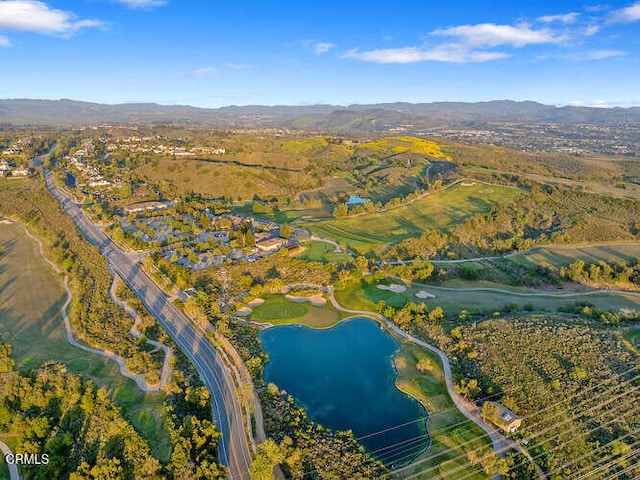 view of property location featuring a water and mountain view