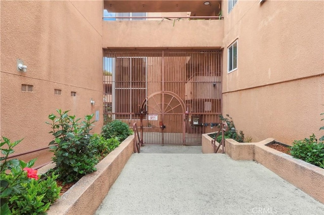 view of patio / terrace featuring a gate
