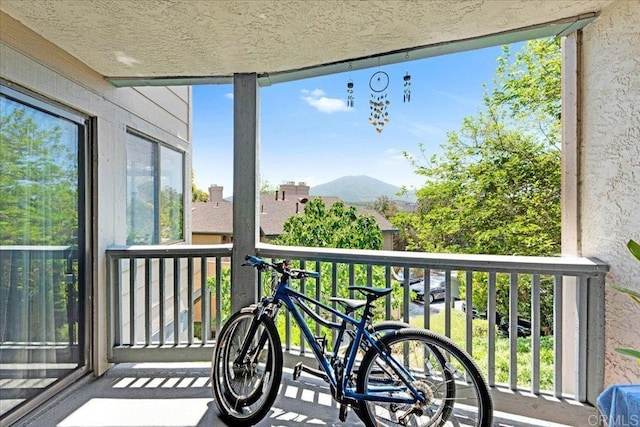 balcony featuring a mountain view