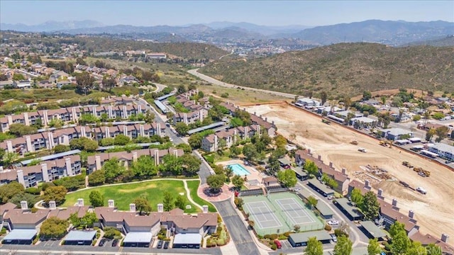 aerial overview of property's location featuring a mountainous background