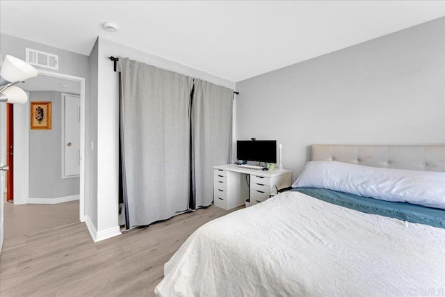 2916 Alanwood Ct, Spring Valley, CA 91978 - bedroom featuring light wood-type flooring and baseboards