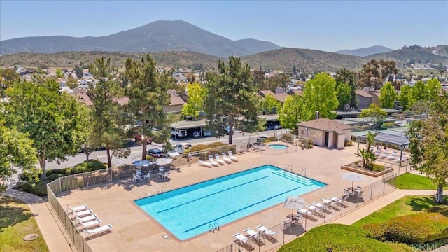 2916 Alanwood Ct, Spring Valley, CA 91978 - community pool featuring a mountain view, a residential view, and a patio