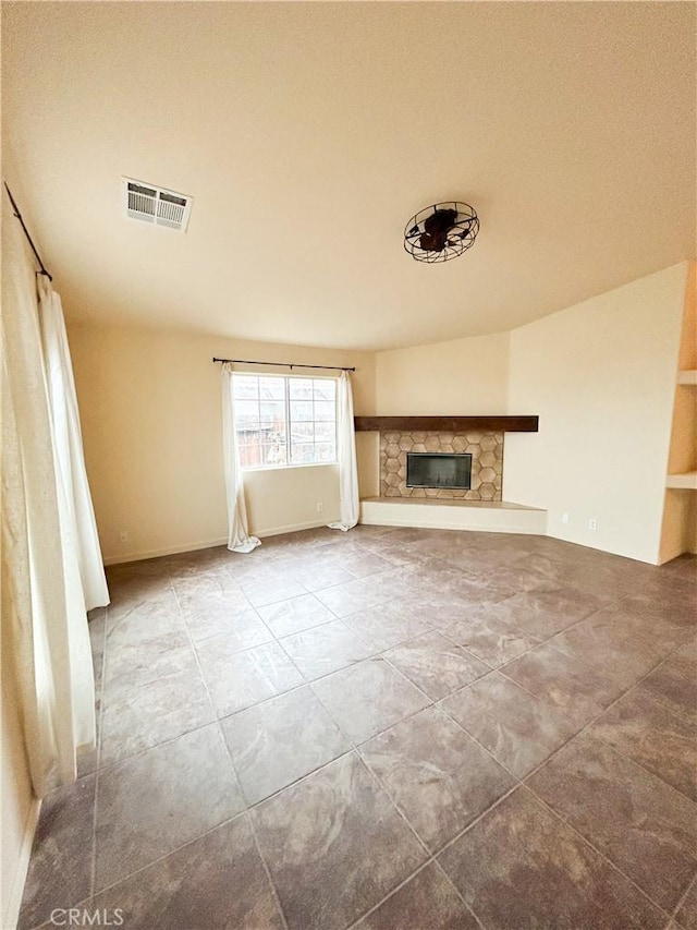 770 Cypress Ln, Blythe, CA 92225 - unfurnished living room with a stone fireplace and baseboards