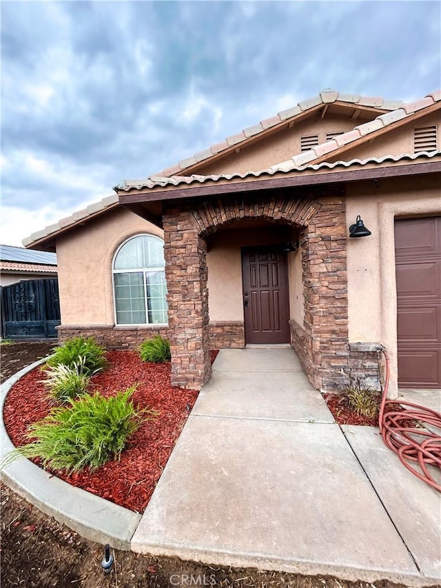 770 Cypress Ln, Blythe, CA 92225 - view of exterior entry with stone siding and stucco siding