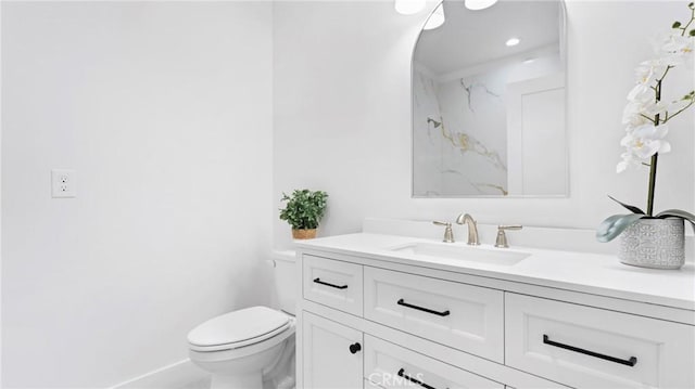 362 S Halcyon Rd, Arroyo Grande, CA 93420 - bathroom with toilet, vanity, and baseboards