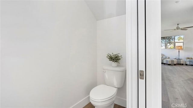 362 S Halcyon Rd, Arroyo Grande, CA 93420 - bathroom featuring wood finished floors, baseboards, a ceiling fan, toilet, and vaulted ceiling